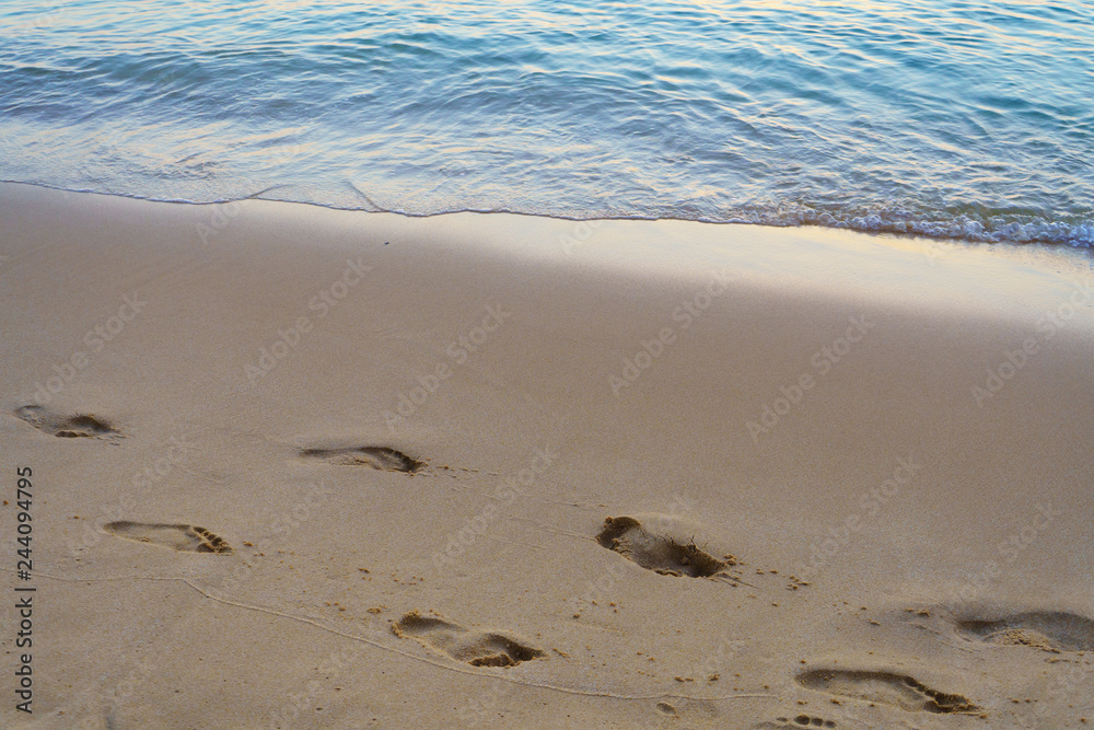 footprints on the beach