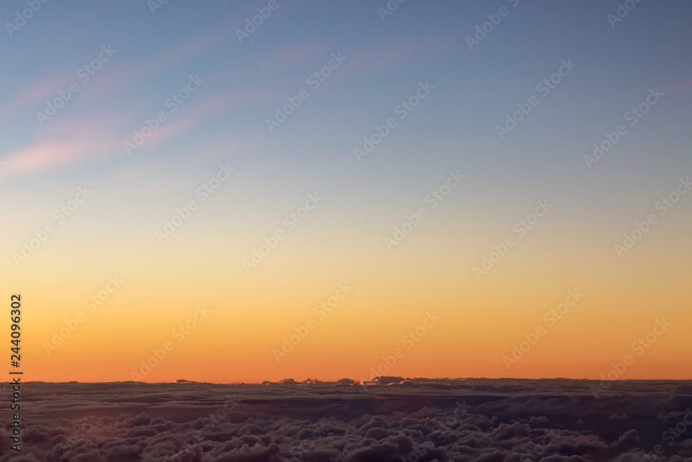 Obraz premium Above the Clouds at Sunset
