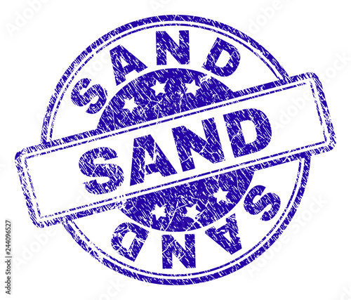 SAND stamp seal imprint with grunge texture. Designed with rounded rectangles and circles. Blue vector rubber print of SAND tag with dirty texture.