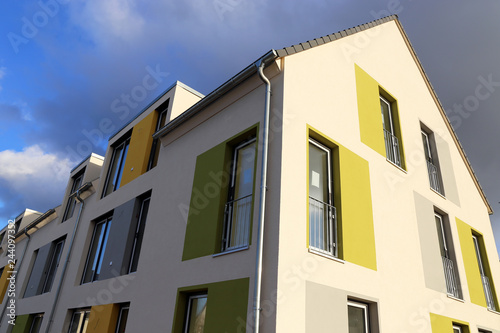 Apartment building with modern facade painting