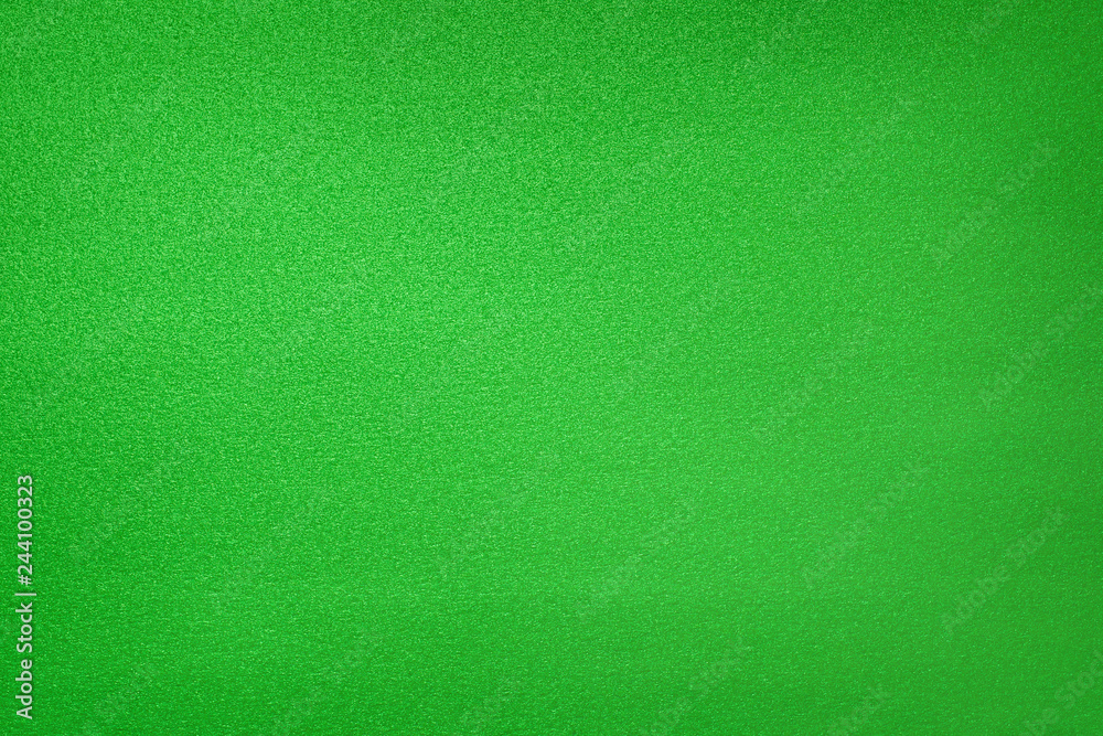 Abstract green glittered foil texture and background