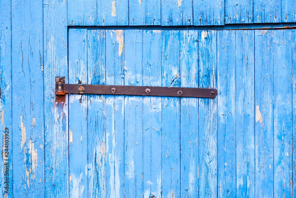 Ausschnitt einer alten blauen Holztür Ausschnitt einer alten blauen Holztür