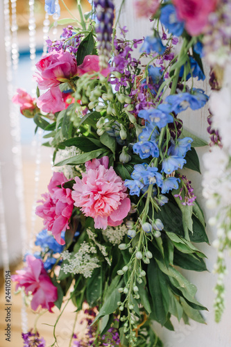 Wallpaper Mural beautiful flowers curl up the wall. soft focus Torontodigital.ca