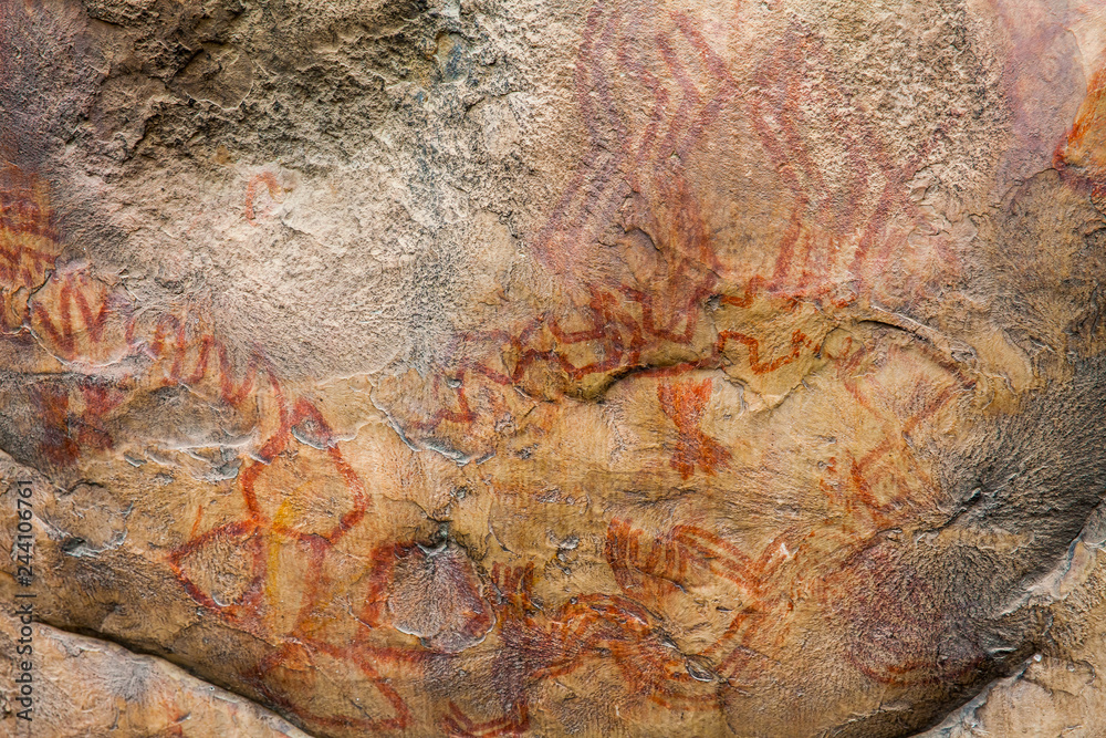 Naklejka premium Prehistoric paintings on rock known as petroglyphs in the municipality of Facatativa in Colombia