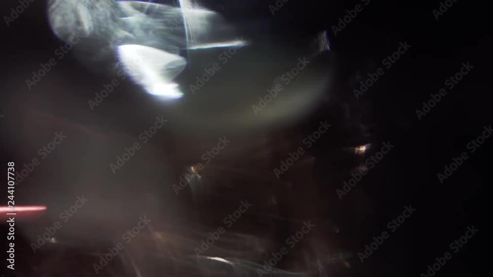 High-quality futuristic background, light transitions, distortion and play over glass on a dark background. High-quality futuristic background, light transitions, distortion and play over glass on a dark background.