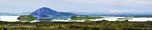 Panorama of Myvatn lake with islets of volcanic pseudocraters in Northern Iceland.