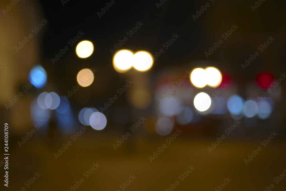 Blurred night lanterns in street