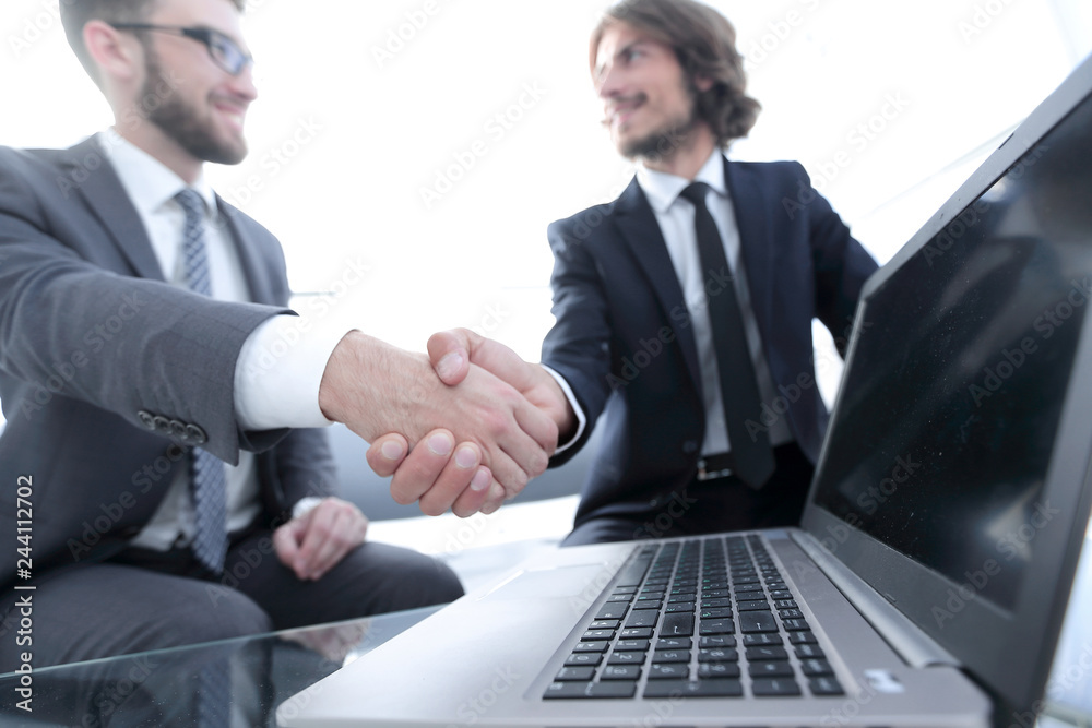 closeup.colleagues shaking hands