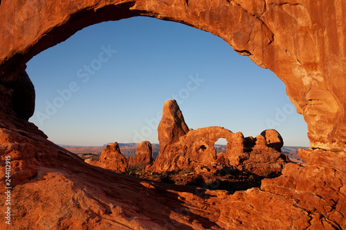 An arch through the arch at sunrise