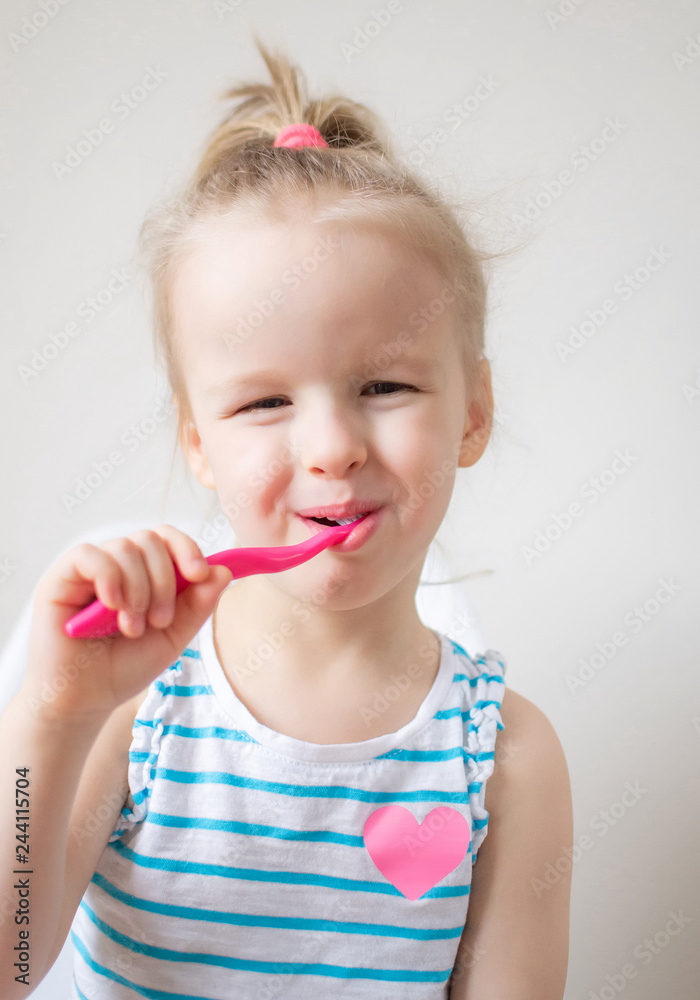 Happy Little Girl Brushing Her Teeth, Pink Toothbrush, Dental Hygiene, Morning Night Healthy Concept Lifestyle Happy Little Girl Brushing Her Teeth, Pink Toothbrush, Dental Hygiene, Morning Night Healthy Concept Lifestyle