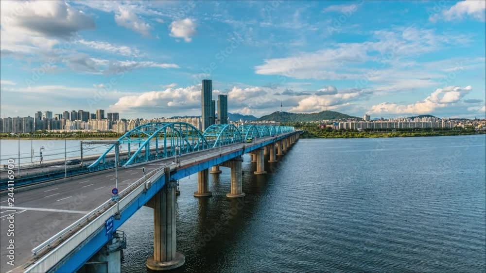Time lapse of Seoul City skyline at Dongjak Bridge and Han river in Seoul, South Korea.