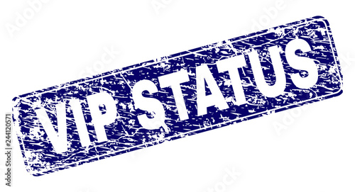 VIP STATUS stamp seal print with distress texture. Seal shape is a rounded rectangle with frame. Blue vector rubber print of VIP STATUS title with grunge texture.