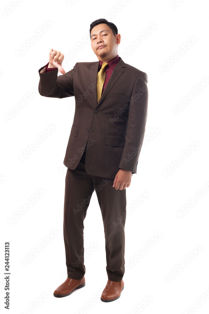 Young Asian Businessman Shows Thumb Down Gesture Young Asian Businessman Shows Thumb Down Gesture