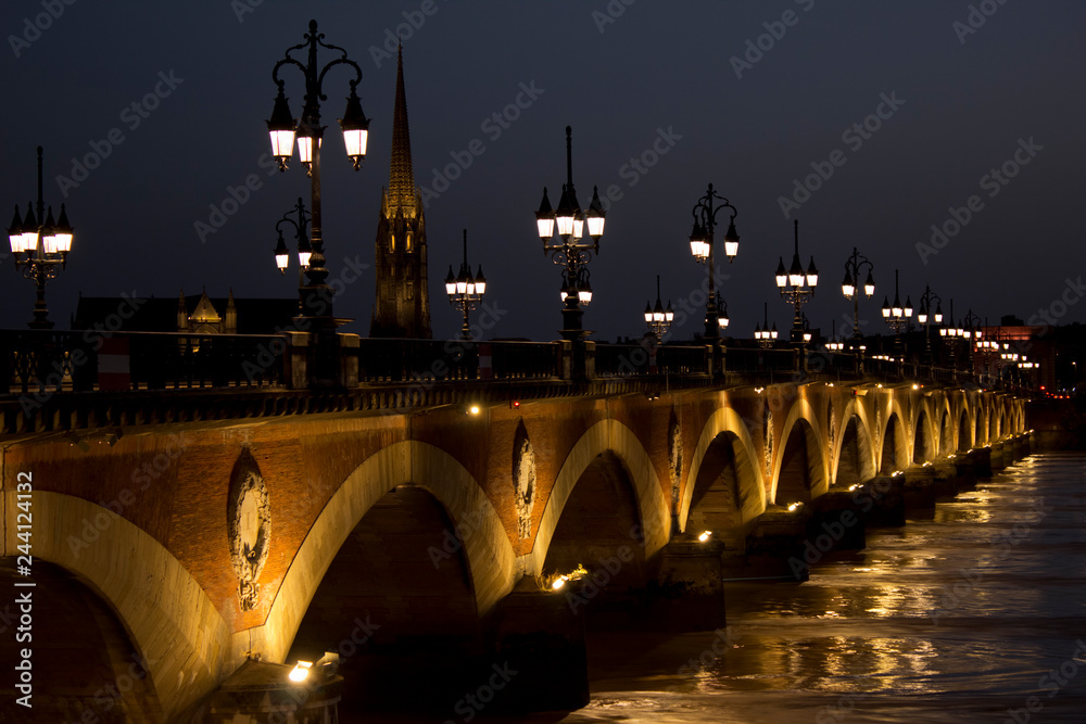 Pont de pierre bridge at night in Bordeaux, France Pont de pierre bridge at night in Bordeaux, France