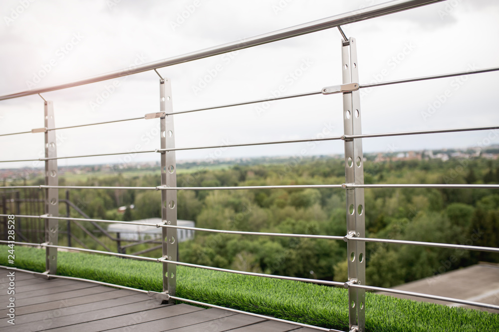 Frameless stainless steel railing on terrace Frameless stainless steel railing on terrace