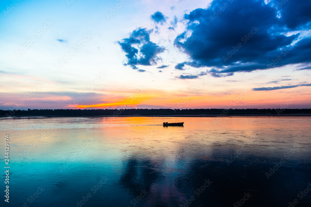 Fototapeta premium Sunset over the Mekong Delta, Kratie, Cambodia 
