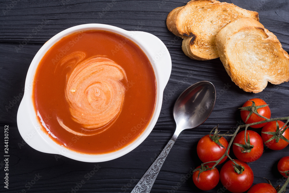 Fresh tomato cream soup in bowl Fresh tomato cream soup in bowl
