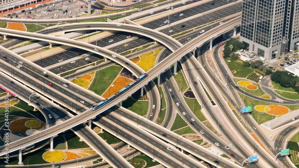 Huge traffic junction with cars and train Huge traffic junction with cars and train