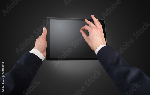 Hand using tablet with no concept and empty space
