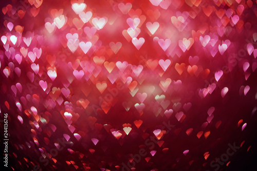 Bright red hearts abstract bokeh background