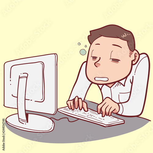 tired worker in front of computer
