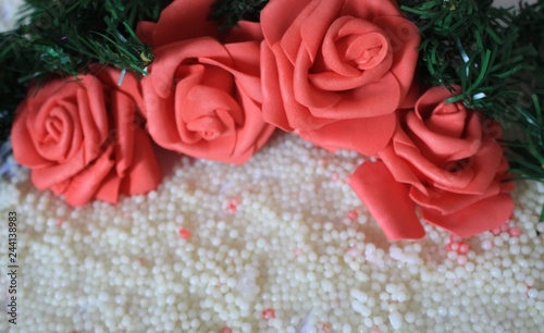 Photoshoot of roses on background sand. Valentine s day