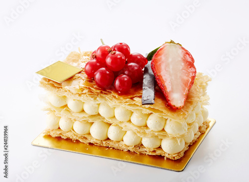 Photography Delicious napoleon crumble cake on white background