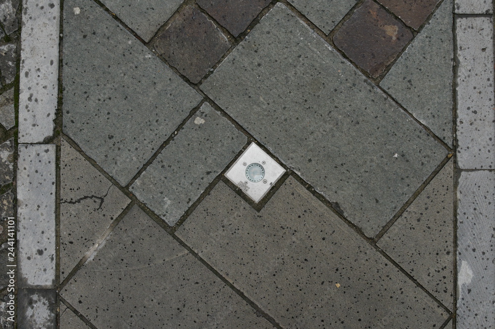 Obraz premium Light in pavement for street decoration