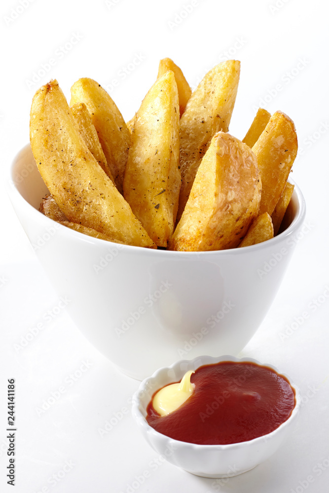 Delicious french fries on a white background