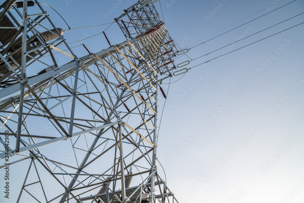 power transmission tower on background of blue sky