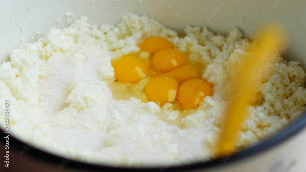 Break egg. Cooking food. Baking ingredients, breaking the eggs, separating yolk from protein. Glass bowl for kneading Break egg. Cooking food. Baking ingredients, breaking the eggs, separating yolk from protein. Glass bowl for kneading