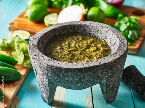mexican salsa verde in traditional stone molcajete