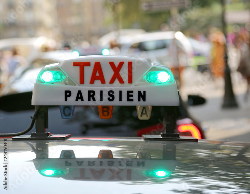 luminous taxi top sign in Paris
