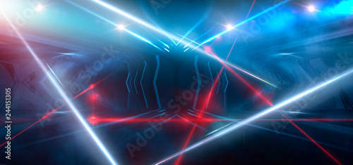 Dark room, street, tunnel, corridor, background with searchlight rays and a red laser beam, smoke, smog, dust. Abstract dark blue background with neon and rays.