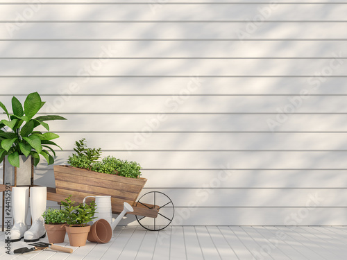 Fototapeta Naklejka Na Ścianę i Meble -  Outdoor terrace with garden equipment  3d render,There are empty white wood plank wall and floor,Sunlight shining to the wall with tree shadow.