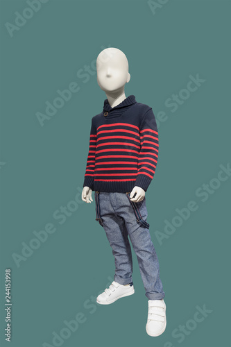Child mannequin dressed in fashionable clothes.