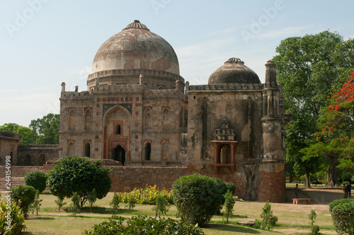 Bada Gumbad mosque in Lodi Park on a sunny afternoon. Delhi, India