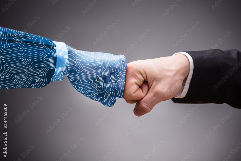 Two Businesspeople Making Fist Bump - obrazy, fototapety, plakaty 