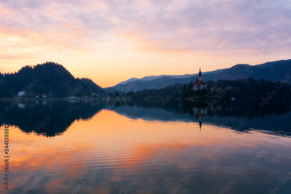 Beautiful sunrise and church on Lake Bled in Slovenia at the springtime