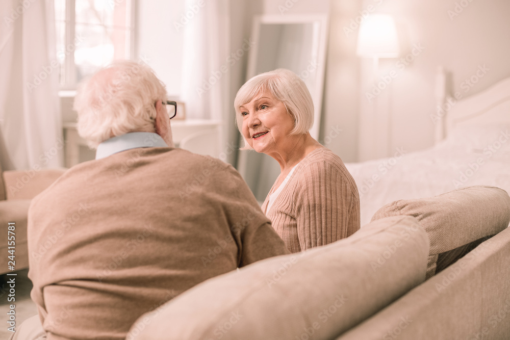 Kind female enjoying pleasant communication with her man Kind female enjoying pleasant communication with her man