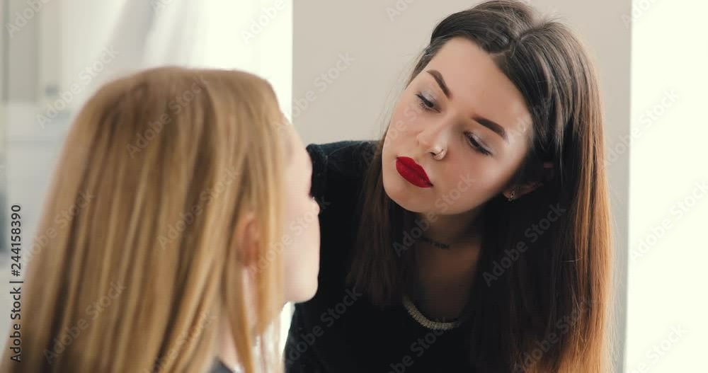 Makeup master working for her client at home Makeup master working for her client at home