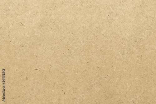 Particle pressed wood panel osb oriented strand board texture pattern background in light beige cream yellow gold color