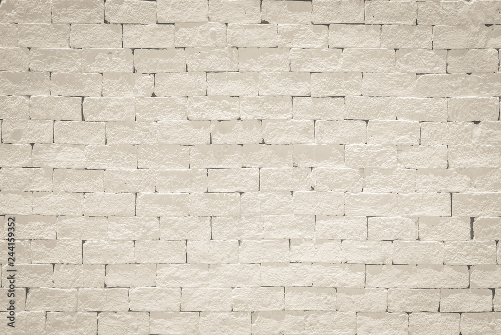 Brick wall pattern texture background painted in light cream beige color Brick wall pattern texture background painted in light cream beige color