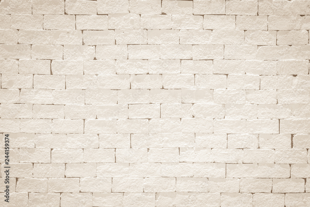 Old aged rough brick wall texture background painted in light beige color in grunge style Old aged rough brick wall texture background painted in light beige color in grunge style