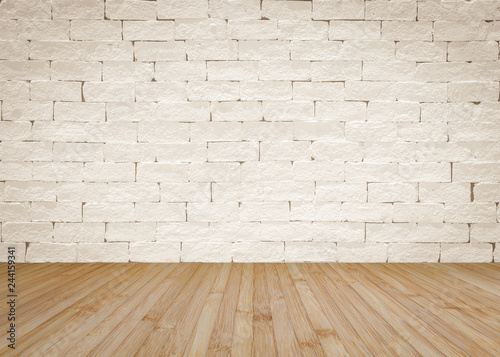 Brick wall painted in cream beige color with wooden floor textured background in natural yellow brown