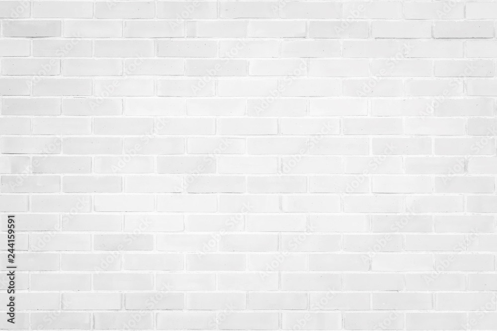 Naklejka premium Brick wall texture pattern background in natural light white grey