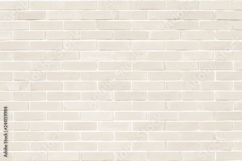 Brick wall texture pattern background in natural light ancient sepia  beige brown color