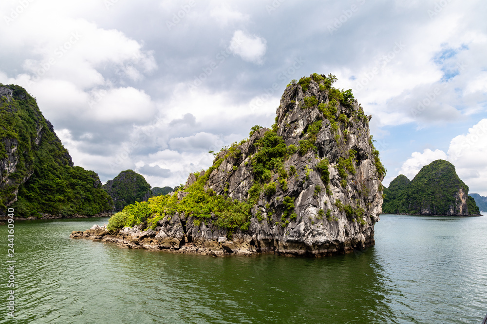 Karst formations in Halong Bay, Vietnam, in the gulf of Tonkin. Halong Bay is a UNESCO World Heritage Site and the most popular tourist spot in Vietnam