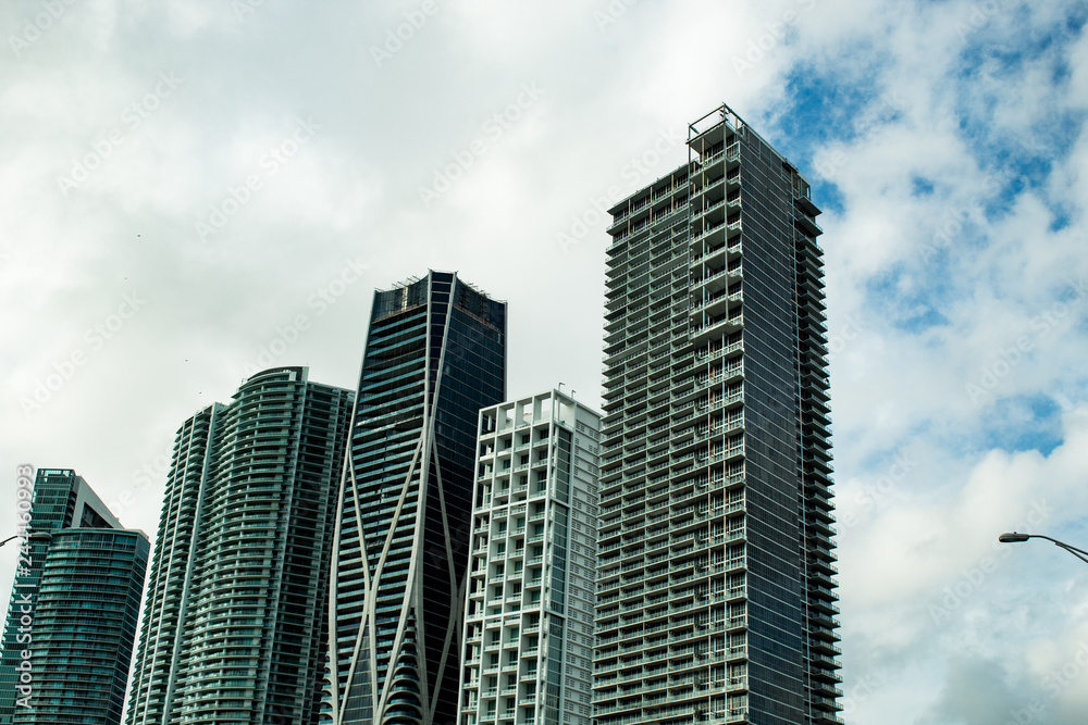Scenic view Downtown Miami's skyscrapers from the road; droad tour in Florida. Scenic view Downtown Miami's skyscrapers from the road; droad tour in Florida.