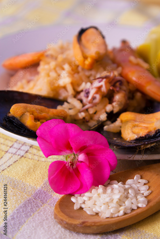 Tasty seafood dish – Paella a la marinera Tasty seafood dish – Paella a la marinera